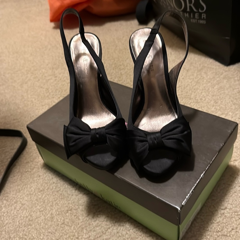 Black peep toe heels by Kelly and Katie.